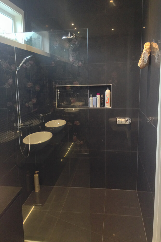 photo of tiled walls and walk in shower
